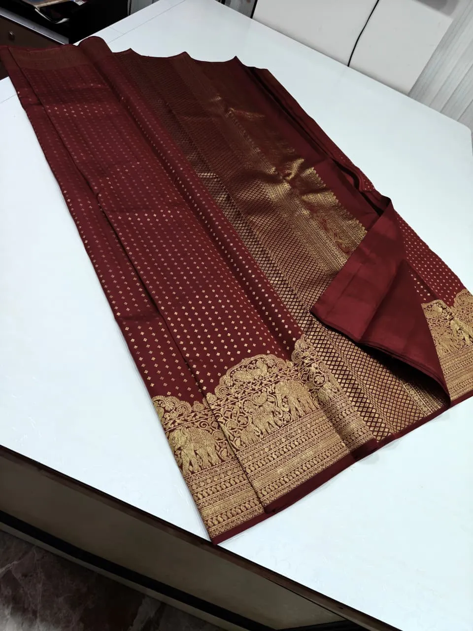 Maroon Kanchipuram Silk Saree with Intricate Gold Zari Woven Border